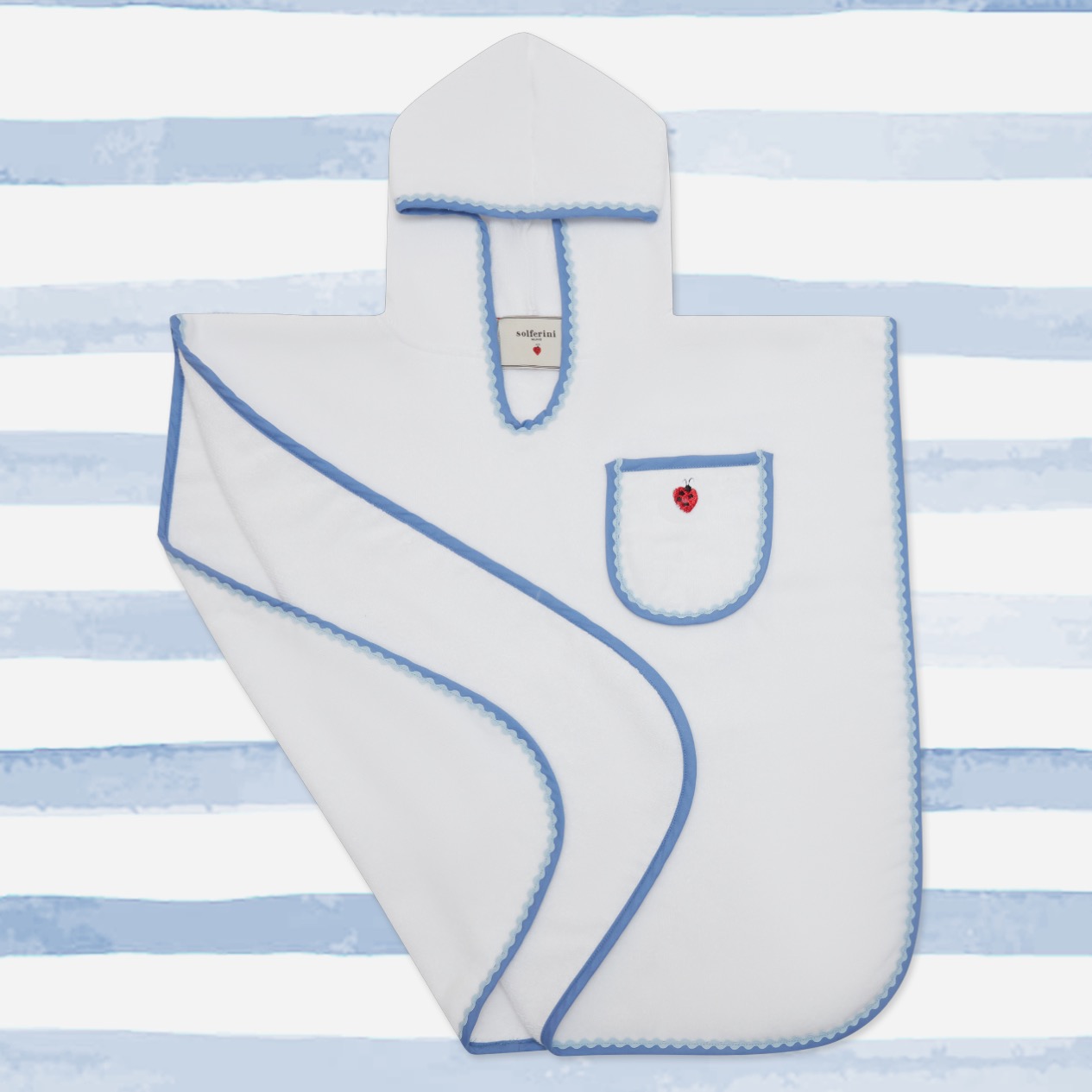 Poncho azzurro righe-STILL LIFE fondo grigino e colorati_QUADRATO