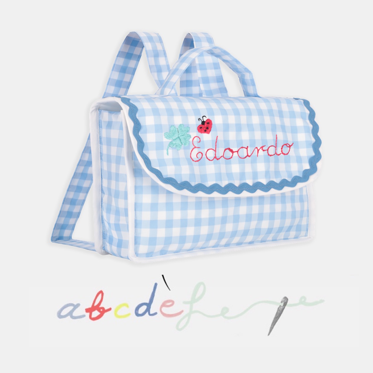 cartella azzurra con ricamo